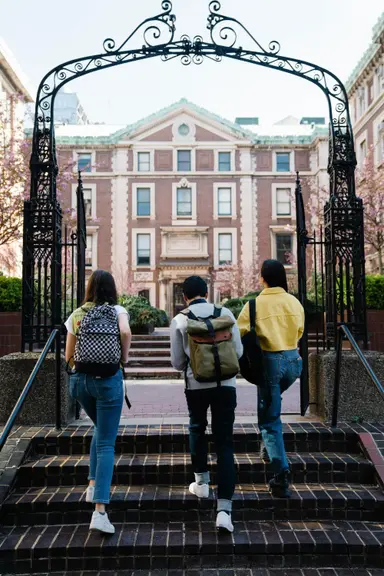 Young adults with backpacks entering college, supported by Cedar Oaks psychiatric therapy and counseling